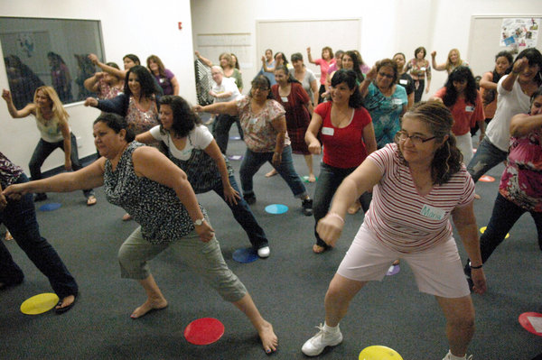 Participants perform exercises they will later teach to their students during the SPARK Early Childhood workshop at Imperial County Office of Education in El Centro on Saturday. JOSELITO VILLERO PHOTO Saturday, October 06, 2012